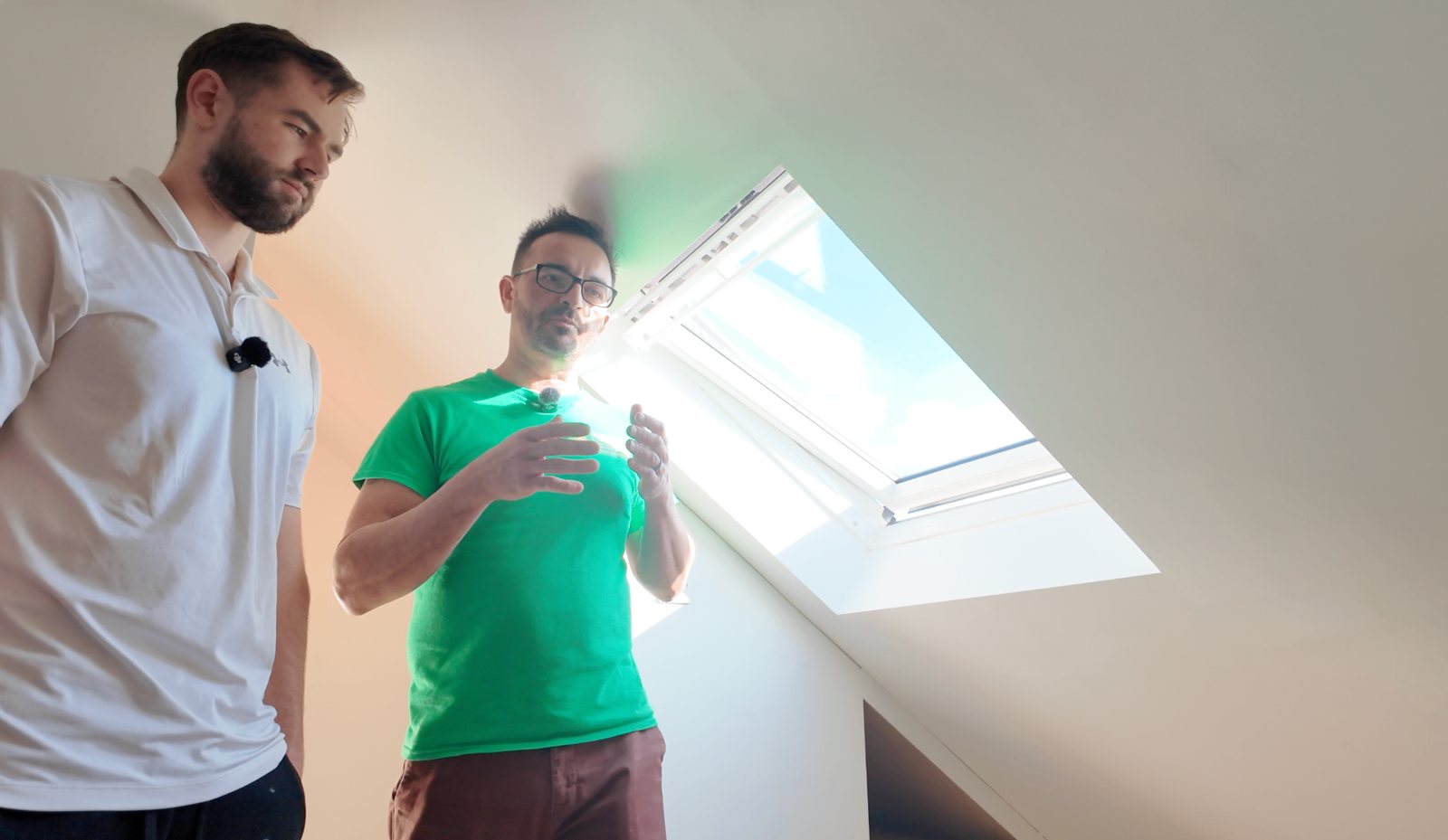 Luke Watkins and Gavin Morris of Paradigm Lofts, mic'd up for filming in a finished loft