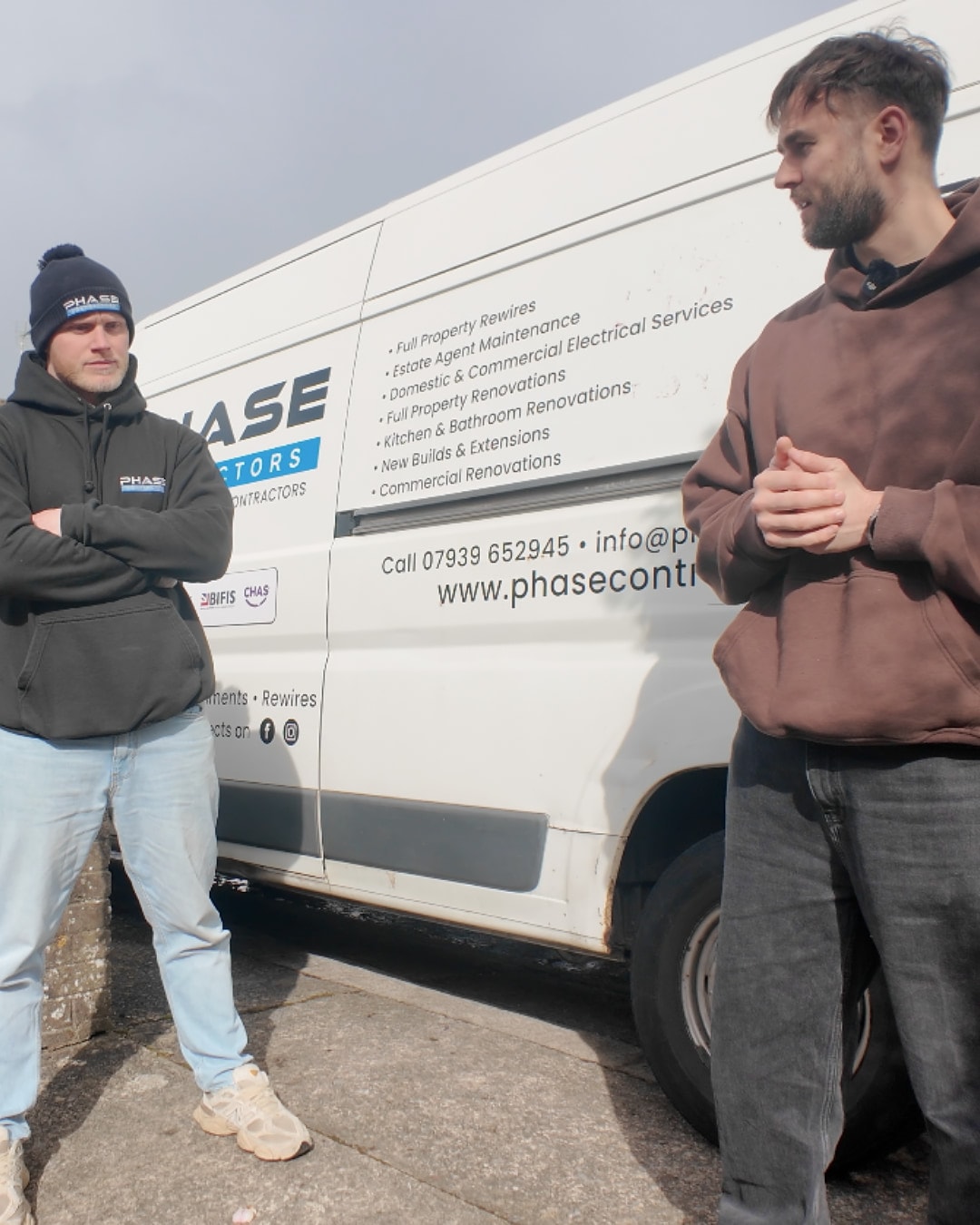 Luke Watkins beside a Phase van
