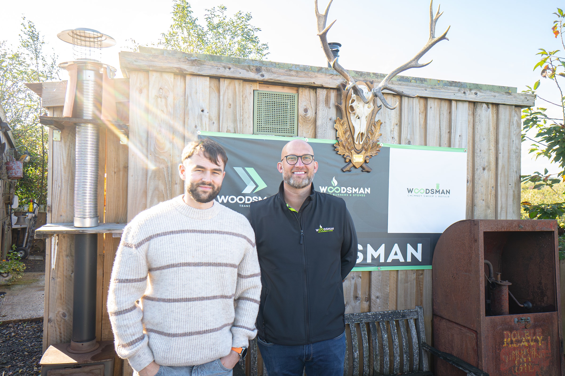 Luke Watkins with the owner of Woodsman, a log burner business